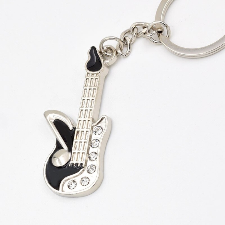 metalowa-gitara-czarna-gitara-z-krysztalkami-breloczek-do-kluczy-dla-gitarzystki-gra-na-gitarze-muzyk-wioslo-elektryczna-gitara