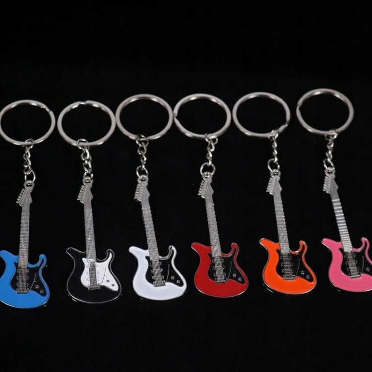 metalowa-gitara-biala-pomaranczowa-czarna-pomaranczowoczarna-breloczek-do-kluczy-dla-gitarzystki-gra-na-gitarze-muzyk-wioslo-elektryczna-gitara